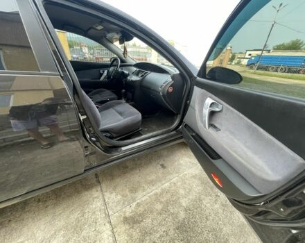 Черный Ниссан Примера, объемом двигателя 2 л и пробегом 186 тыс. км за 3500 $, фото 15 на Automoto.ua