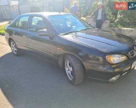 Черный Ниссан Примера, объемом двигателя 1.6 л и пробегом 377 тыс. км за 3200 $, фото 3 на Automoto.ua