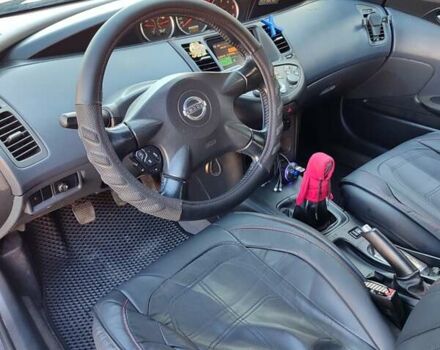 Черный Ниссан Примера, объемом двигателя 1.87 л и пробегом 287 тыс. км за 5500 $, фото 12 на Automoto.ua