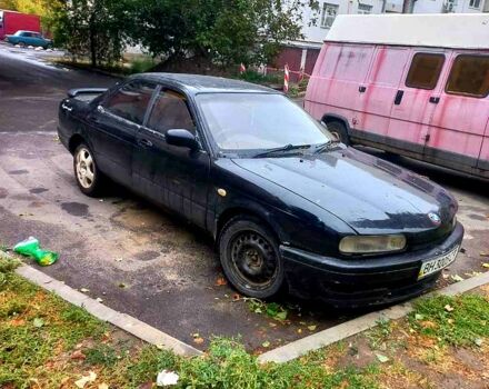 Черный Ниссан Примера, объемом двигателя 1.8 л и пробегом 123 тыс. км за 700 $, фото 1 на Automoto.ua