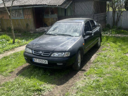 Чорний Ніссан Прімера, об'ємом двигуна 2 л та пробігом 350 тис. км за 2700 $, фото 1 на Automoto.ua