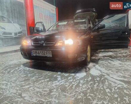 Черный Ниссан Примера, объемом двигателя 1.6 л и пробегом 340 тыс. км за 2000 $, фото 1 на Automoto.ua