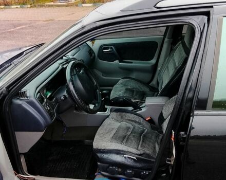 Черный Ниссан Примера, объемом двигателя 1.8 л и пробегом 290 тыс. км за 2000 $, фото 1 на Automoto.ua