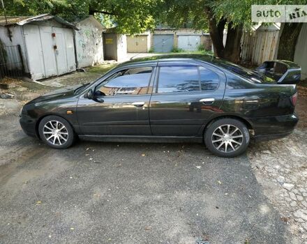 Черный Ниссан Примера, объемом двигателя 2 л и пробегом 234 тыс. км за 1999 $, фото 1 на Automoto.ua