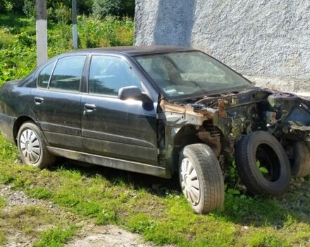 Черный Ниссан Примера, объемом двигателя 2 л и пробегом 11 тыс. км за 800 $, фото 1 на Automoto.ua
