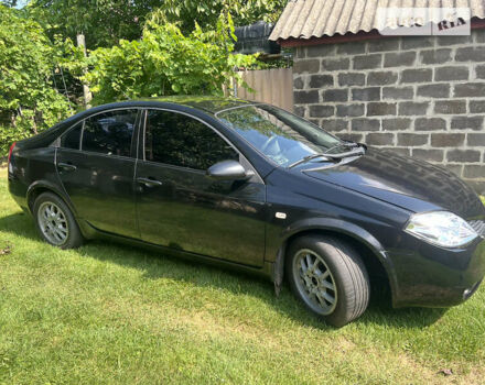 Черный Ниссан Примера, объемом двигателя 2 л и пробегом 178 тыс. км за 3500 $, фото 1 на Automoto.ua