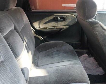 Фиолетовый Ниссан Примера, объемом двигателя 2 л и пробегом 200 тыс. км за 1700 $, фото 5 на Automoto.ua