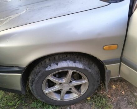 Коричневий Ніссан Прімера, об'ємом двигуна 2 л та пробігом 200 тис. км за 1600 $, фото 6 на Automoto.ua