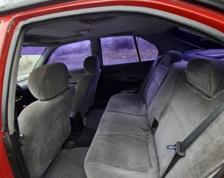 Красный Ниссан Примера, объемом двигателя 2 л и пробегом 323 тыс. км за 2300 $, фото 1 на Automoto.ua