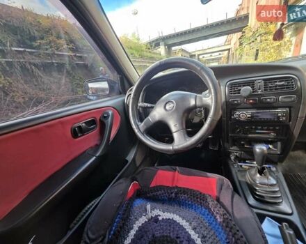 Красный Ниссан Примера, объемом двигателя 2 л и пробегом 403 тыс. км за 2900 $, фото 10 на Automoto.ua