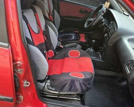 Красный Ниссан Примера, объемом двигателя 2 л и пробегом 403 тыс. км за 2900 $, фото 8 на Automoto.ua