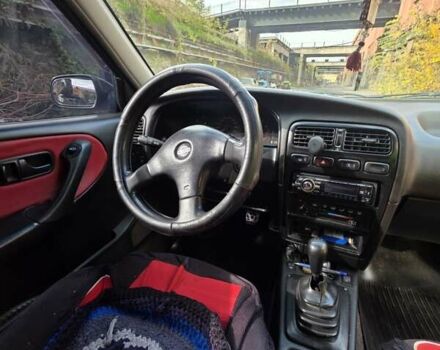 Красный Ниссан Примера, объемом двигателя 2 л и пробегом 403 тыс. км за 2900 $, фото 13 на Automoto.ua