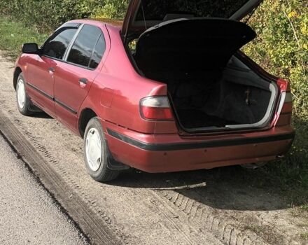 Красный Ниссан Примера, объемом двигателя 1.6 л и пробегом 332 тыс. км за 2600 $, фото 4 на Automoto.ua