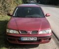 Красный Ниссан Примера, объемом двигателя 1.6 л и пробегом 332 тыс. км за 2600 $, фото 1 на Automoto.ua