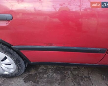 Червоний Ніссан Прімера, об'ємом двигуна 2 л та пробігом 330 тис. км за 2000 $, фото 2 на Automoto.ua