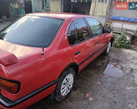 Червоний Ніссан Прімера, об'ємом двигуна 2 л та пробігом 330 тис. км за 2000 $, фото 1 на Automoto.ua