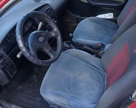 Червоний Ніссан Прімера, об'ємом двигуна 2 л та пробігом 330 тис. км за 2000 $, фото 7 на Automoto.ua