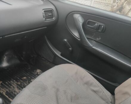 Червоний Ніссан Прімера, об'ємом двигуна 1.6 л та пробігом 400 тис. км за 1300 $, фото 6 на Automoto.ua