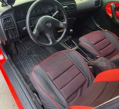 Красный Ниссан Примера, объемом двигателя 2 л и пробегом 250 тыс. км за 3000 $, фото 5 на Automoto.ua