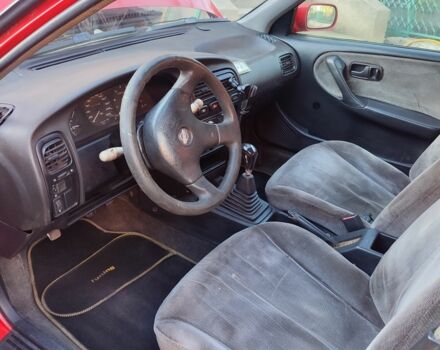 Красный Ниссан Примера, объемом двигателя 1.6 л и пробегом 170 тыс. км за 1677 $, фото 4 на Automoto.ua