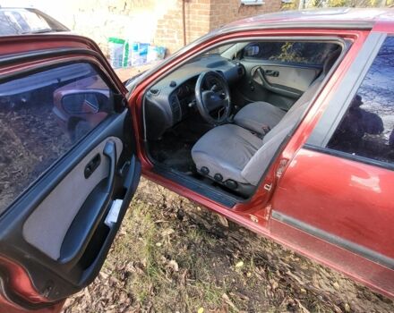 Красный Ниссан Примера, объемом двигателя 1.6 л и пробегом 200 тыс. км за 2000 $, фото 6 на Automoto.ua