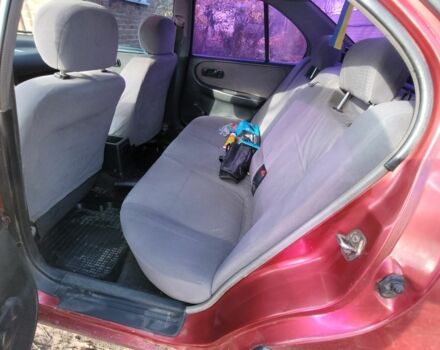 Красный Ниссан Примера, объемом двигателя 1.6 л и пробегом 200 тыс. км за 2000 $, фото 3 на Automoto.ua