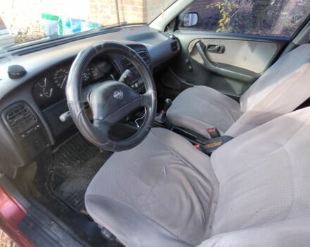 Красный Ниссан Примера, объемом двигателя 1.6 л и пробегом 200 тыс. км за 2000 $, фото 4 на Automoto.ua