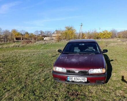 Червоний Ніссан Прімера, об'ємом двигуна 2 л та пробігом 486 тис. км за 1600 $, фото 1 на Automoto.ua
