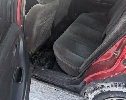 Красный Ниссан Примера, объемом двигателя 2 л и пробегом 434 тыс. км за 2100 $, фото 5 на Automoto.ua