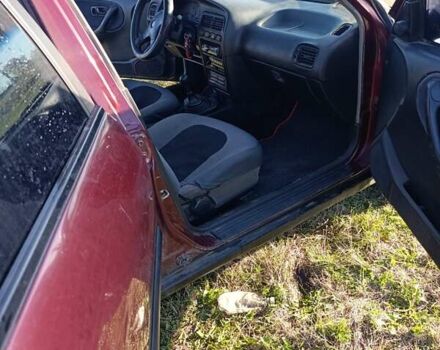 Червоний Ніссан Прімера, об'ємом двигуна 2 л та пробігом 486 тис. км за 1600 $, фото 6 на Automoto.ua