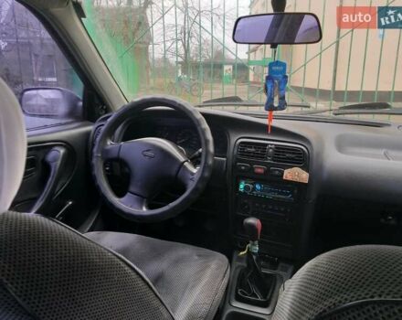 Красный Ниссан Примера, объемом двигателя 1.6 л и пробегом 230 тыс. км за 2500 $, фото 2 на Automoto.ua