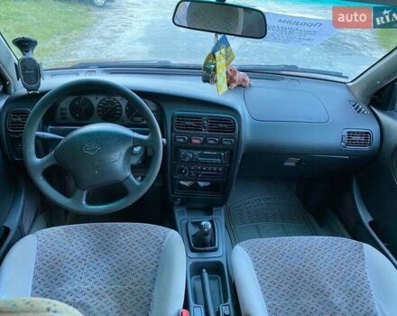 Красный Ниссан Примера, объемом двигателя 1.6 л и пробегом 77 тыс. км за 1500 $, фото 5 на Automoto.ua