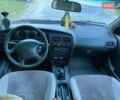 Красный Ниссан Примера, объемом двигателя 1.6 л и пробегом 77 тыс. км за 1500 $, фото 5 на Automoto.ua