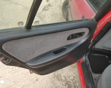 Красный Ниссан Примера, объемом двигателя 1.6 л и пробегом 244 тыс. км за 670 $, фото 6 на Automoto.ua