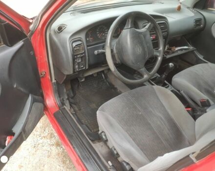 Красный Ниссан Примера, объемом двигателя 1.6 л и пробегом 244 тыс. км за 670 $, фото 7 на Automoto.ua