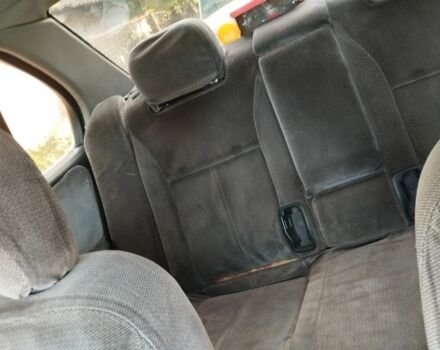 Красный Ниссан Примера, объемом двигателя 1.6 л и пробегом 362 тыс. км за 1061 $, фото 7 на Automoto.ua