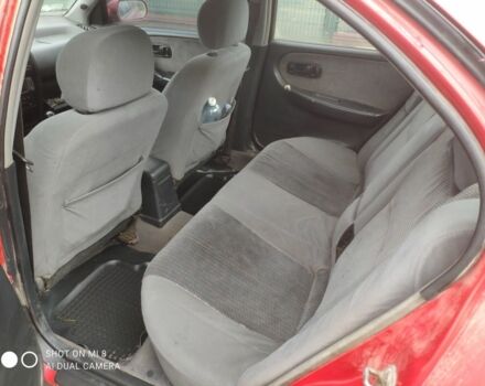 Красный Ниссан Примера, объемом двигателя 1.6 л и пробегом 244 тыс. км за 670 $, фото 5 на Automoto.ua