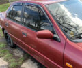 Красный Ниссан Примера, объемом двигателя 2 л и пробегом 329 тыс. км за 1800 $, фото 4 на Automoto.ua
