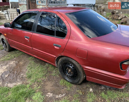 Красный Ниссан Примера, объемом двигателя 2 л и пробегом 329 тыс. км за 1800 $, фото 7 на Automoto.ua