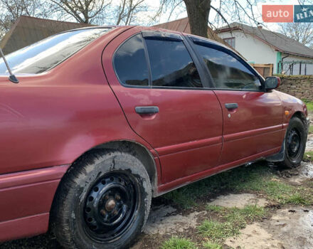 Красный Ниссан Примера, объемом двигателя 2 л и пробегом 329 тыс. км за 1800 $, фото 5 на Automoto.ua