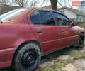 Красный Ниссан Примера, объемом двигателя 2 л и пробегом 329 тыс. км за 1800 $, фото 5 на Automoto.ua