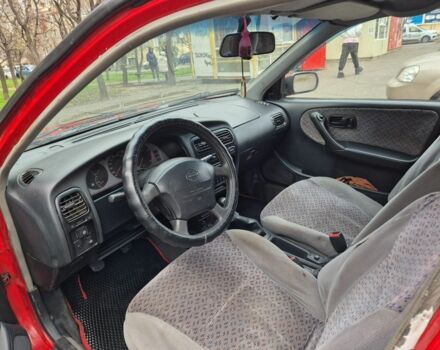 Красный Ниссан Примера, объемом двигателя 2 л и пробегом 470 тыс. км за 1800 $, фото 6 на Automoto.ua