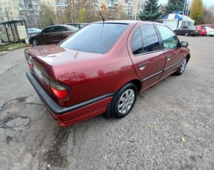 Красный Ниссан Примера, объемом двигателя 1.6 л и пробегом 250 тыс. км за 2499 $, фото 4 на Automoto.ua