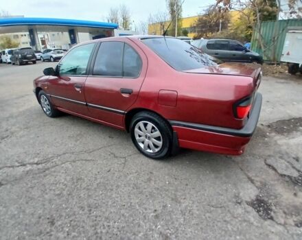 Червоний Ніссан Прімера, об'ємом двигуна 1.6 л та пробігом 250 тис. км за 2100 $, фото 2 на Automoto.ua