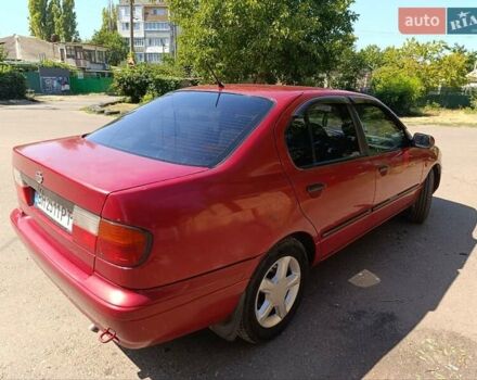 Червоний Ніссан Прімера, об'ємом двигуна 2 л та пробігом 297 тис. км за 2900 $, фото 5 на Automoto.ua