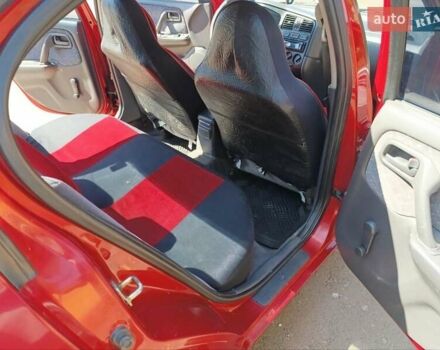 Червоний Ніссан Прімера, об'ємом двигуна 2 л та пробігом 297 тис. км за 2900 $, фото 12 на Automoto.ua