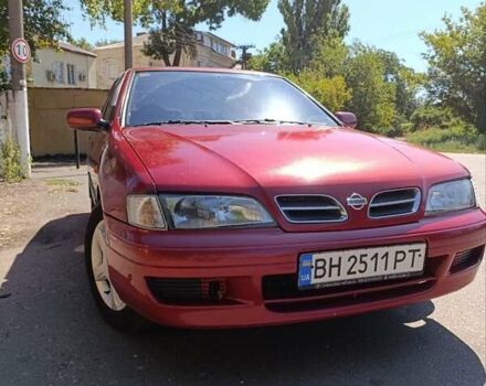 Червоний Ніссан Прімера, об'ємом двигуна 2 л та пробігом 297 тис. км за 2900 $, фото 9 на Automoto.ua