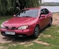 Красный Ниссан Примера, объемом двигателя 2 л и пробегом 246 тыс. км за 3500 $, фото 1 на Automoto.ua