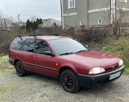 Червоний Ніссан Прімера, об'ємом двигуна 2 л та пробігом 400 тис. км за 1199 $, фото 9 на Automoto.ua