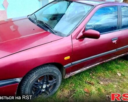 Красный Ниссан Примера, объемом двигателя 2 л и пробегом 350 тыс. км за 700 $, фото 1 на Automoto.ua
